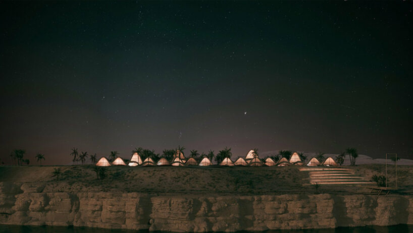camouflaged kapar volumes emerge from arid irani landscape in ribbon-like chabahar resort by disc architects