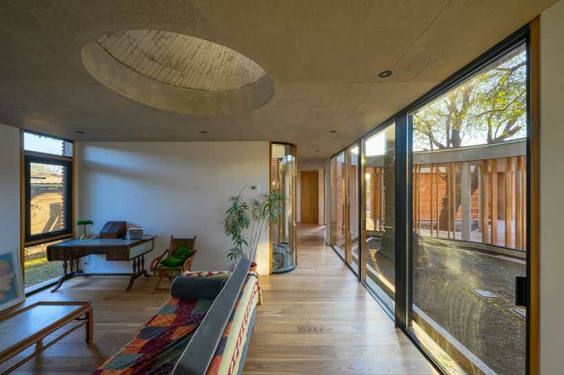 las marías house winds around profuse tree vegetation in cordoba city, argentina