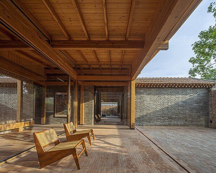 archstudio enlivens courtyard house in beijing with new, multipurpose wooden extension