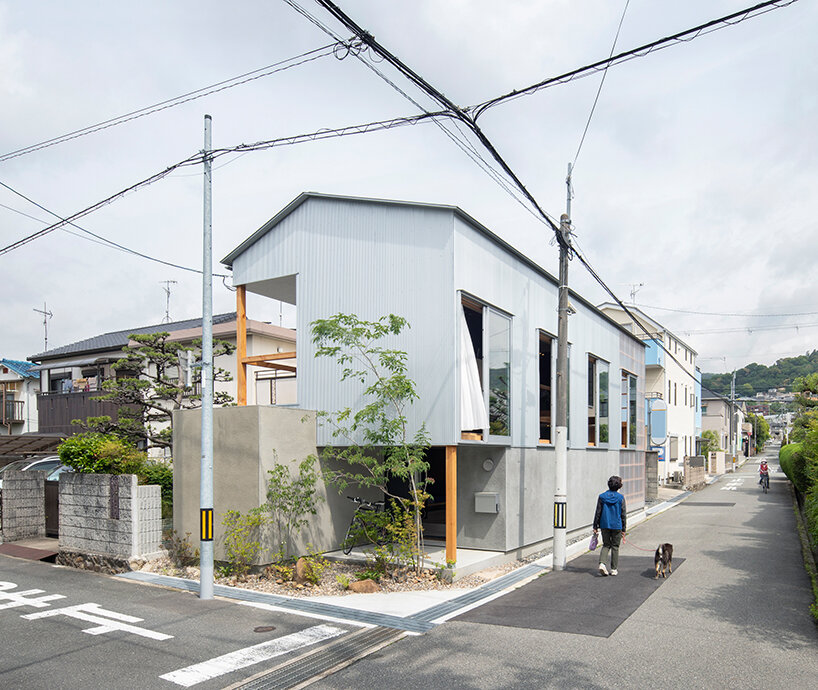 this composite house in osaka incorporates the diversity of its surroundings