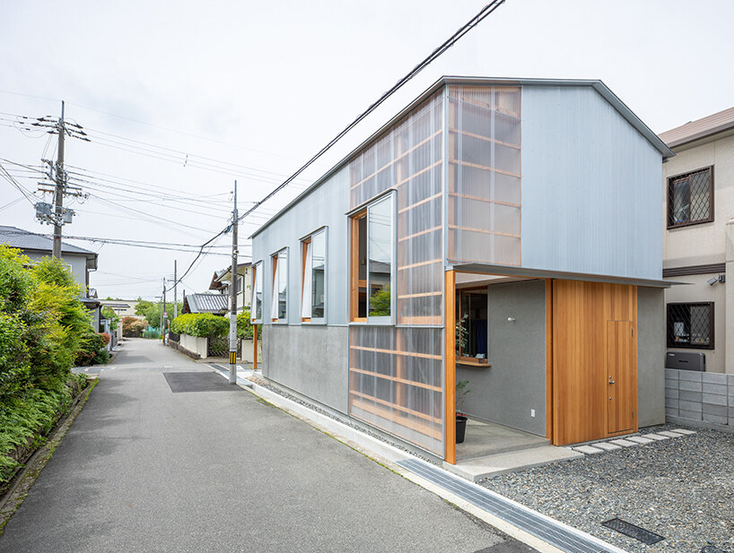 this composite house in osaka incorporates the diversity of its surroundings