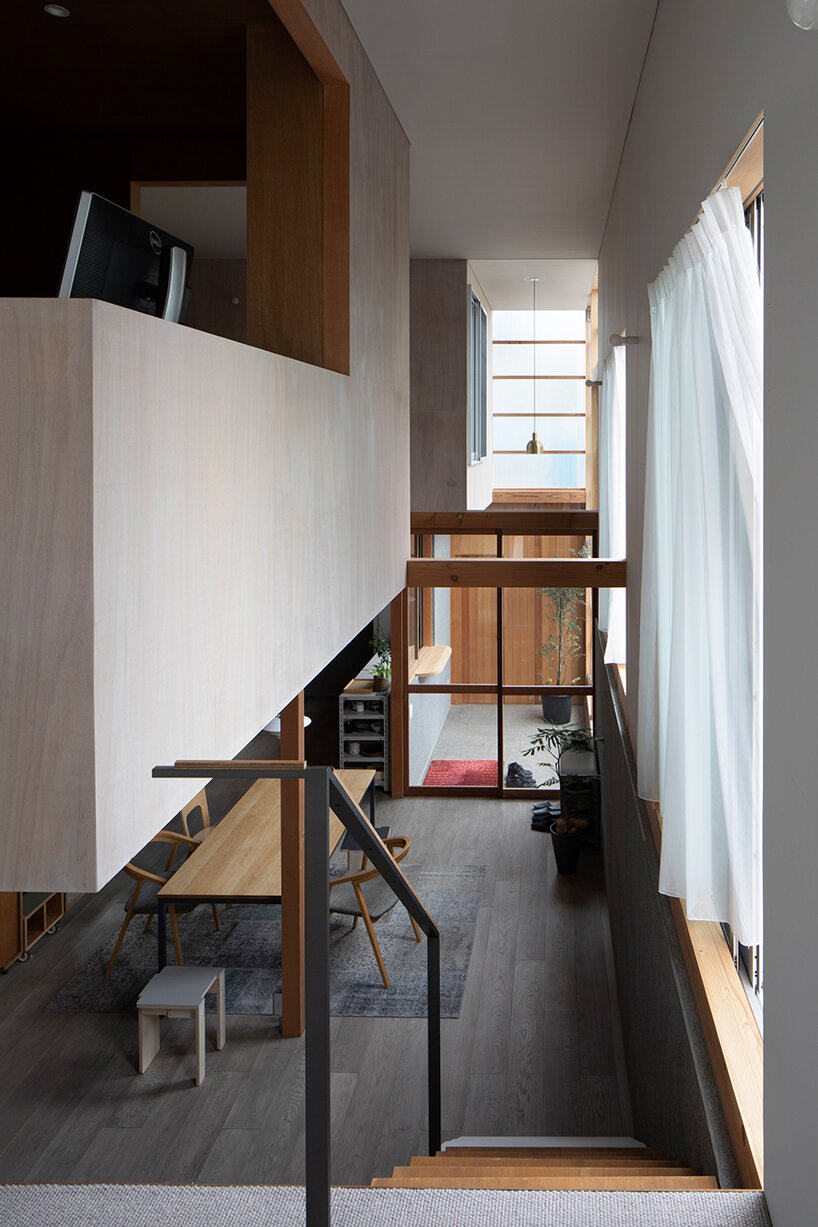 this composite house in osaka incorporates the diversity of its surroundings