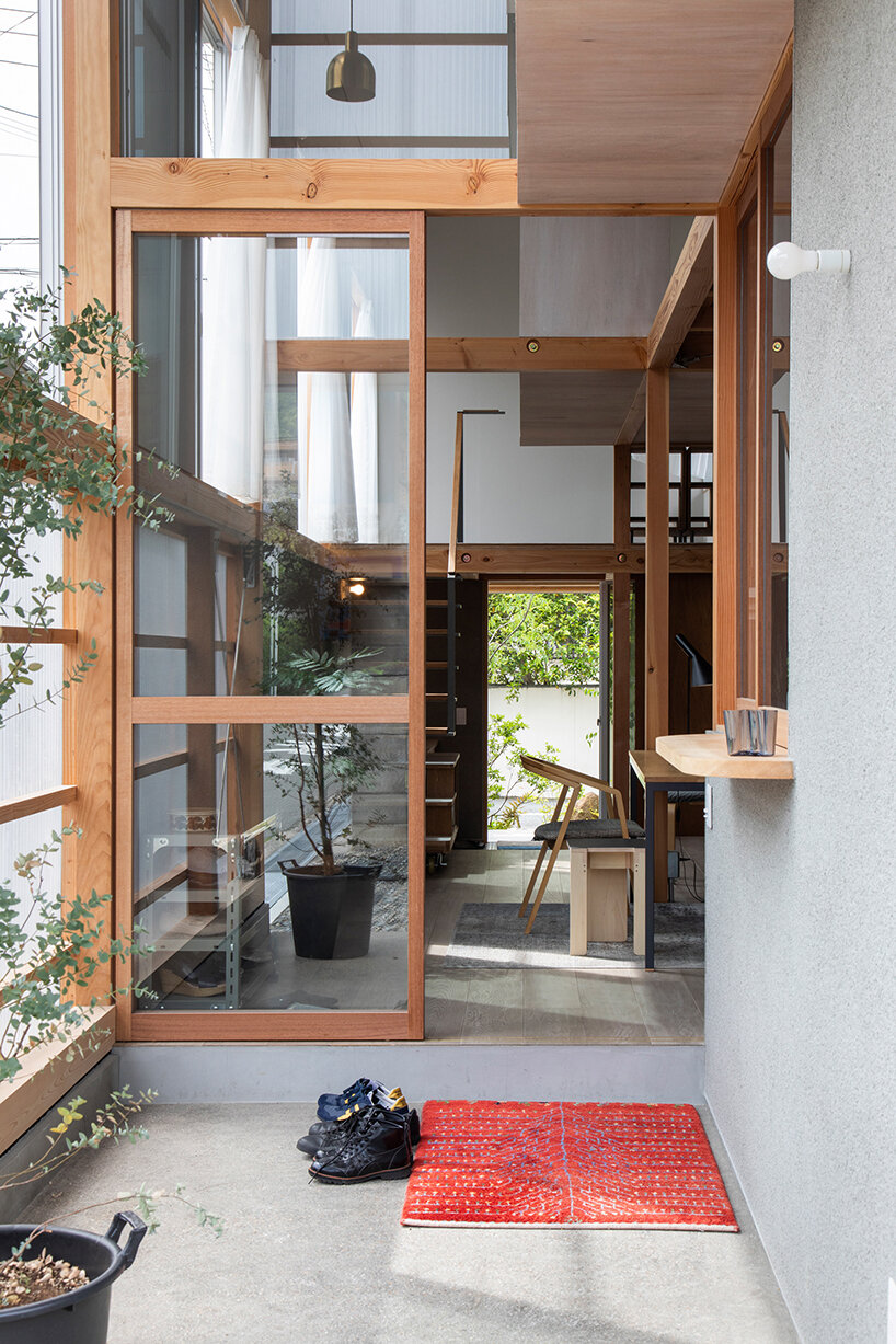 this composite house in osaka incorporates the diversity of its surroundings