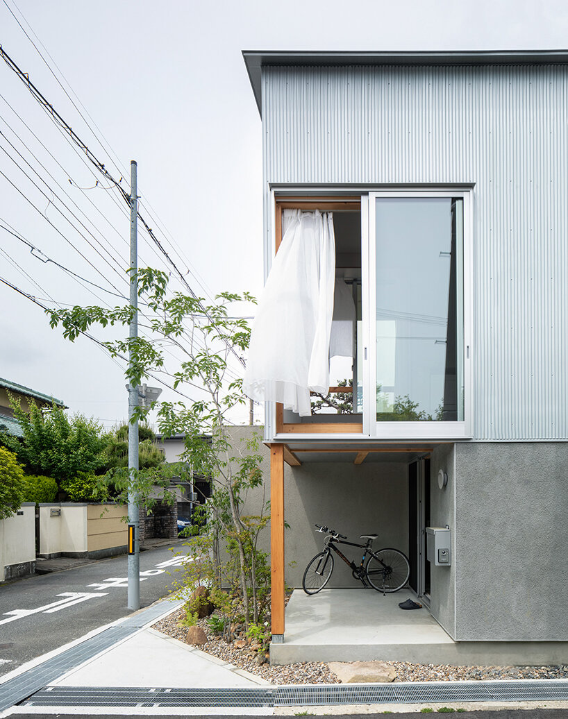 this composite house in osaka incorporates the diversity of its surroundings