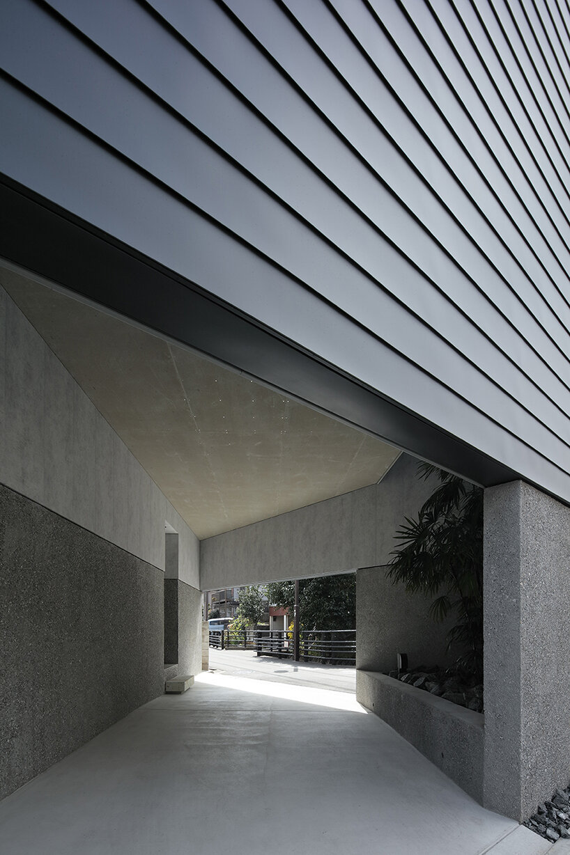 S design farm wraps pentagon-shaped house in tokyo with windowless facades