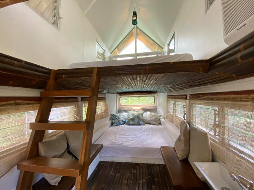 filipino designer converts old jeepney into two-story campervan home
