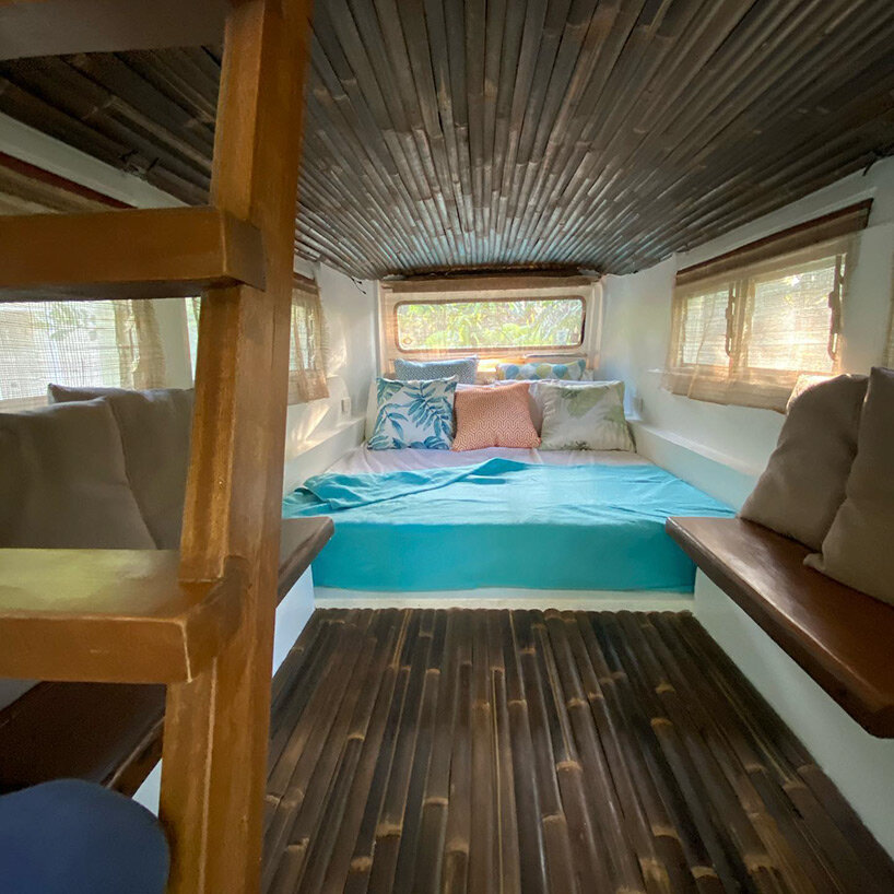 filipino designer converts old jeepney into two-story campervan home