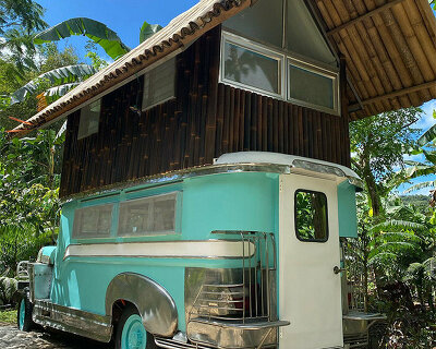 filipino designer converts old jeepney into two-story campervan home