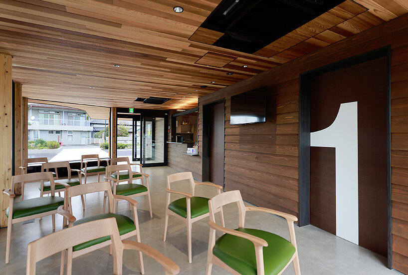symbolic circular skylight fills sugawaradaisuke's family clinic in japan with natural light