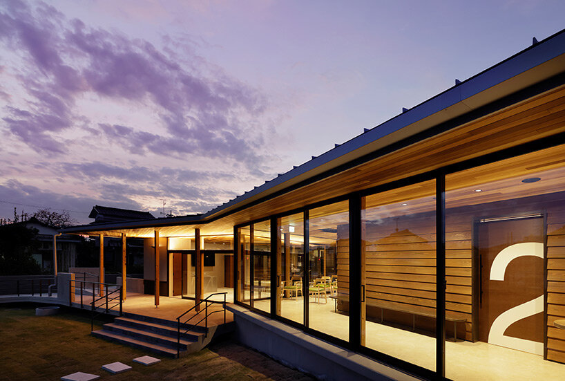 symbolic circular skylight fills sugawaradaisuke's family clinic in japan with natural light