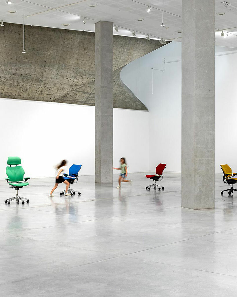 Urs Fischer's office chairs dance playfully adopting human behaviors