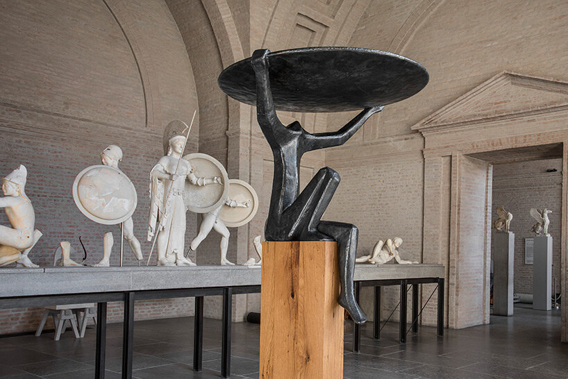 calatrava's sculptural works emerge through ancient greek statues at the glyptothek museum