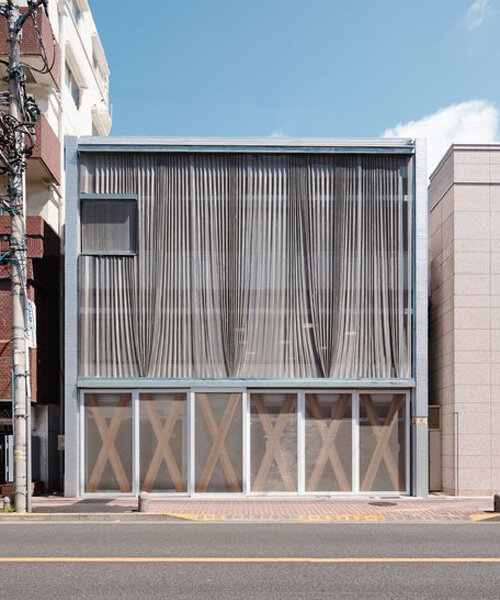 T2P architects seals the X office facade with a metallic mesh curtain in tokyo
