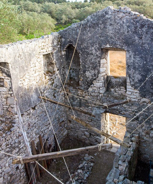 talmon biran's installation explores states of balance amid architectural ruins in greece