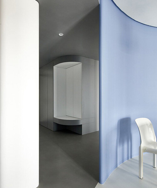 xigo studio’s minimal apartment in beijing draws on the 'atom' to exude light and vitality