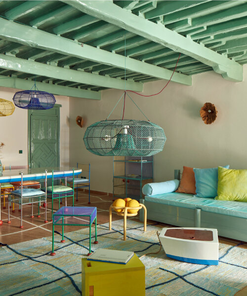 vibrant colors pop inside 4rooms, an artist's playground in kastellorizo, greece