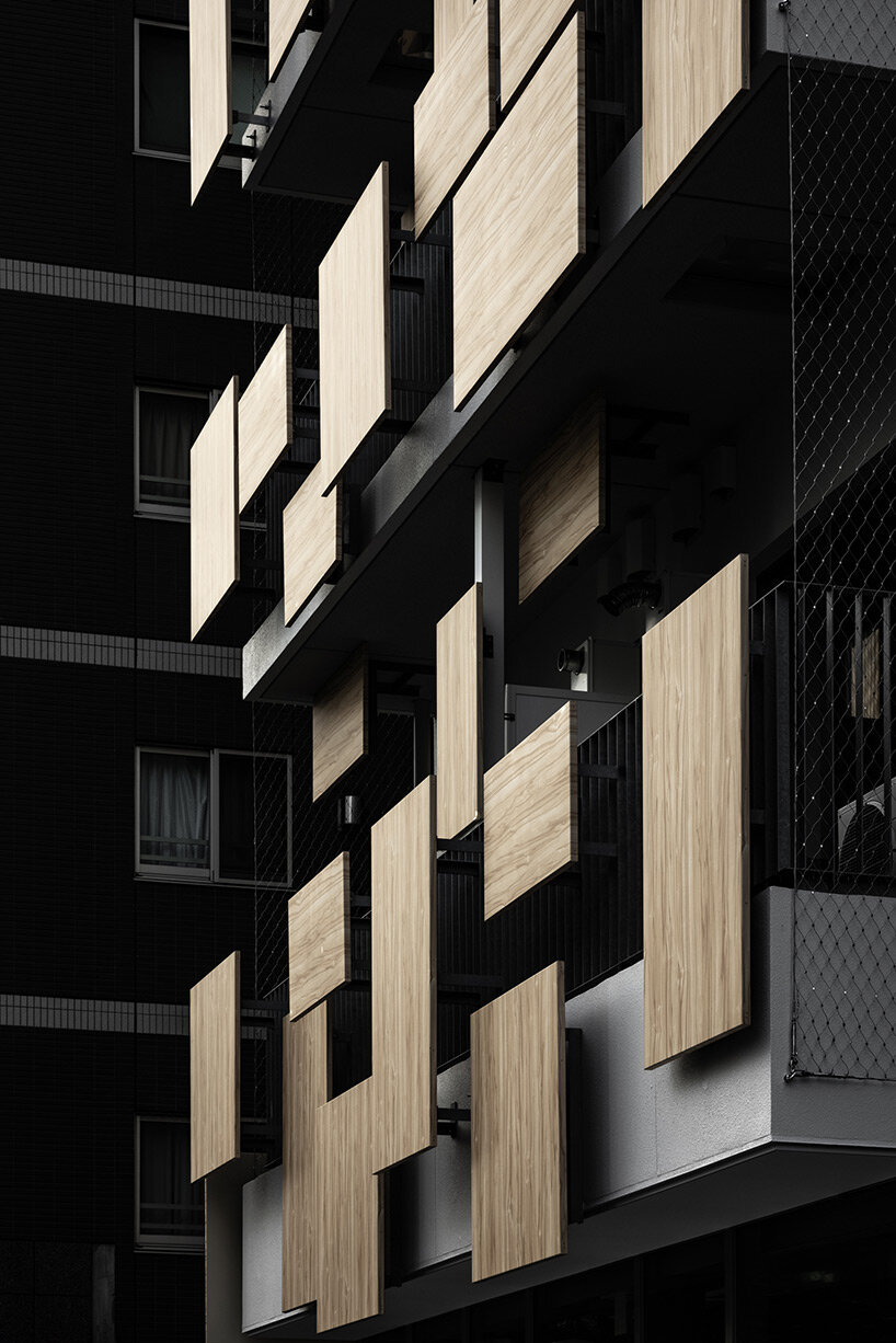 aluminum panels printed on wood pattern tetris-up the facade of kengo kuma's tokyo house