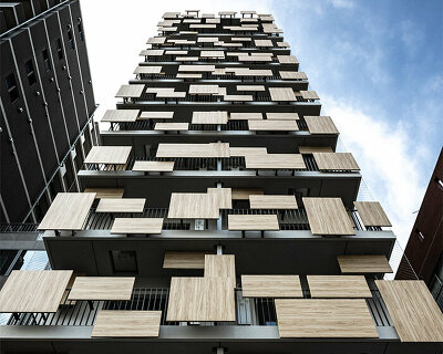 aluminum panels printed on wood pattern tetris-up the facade of kengo kuma's tokyo house
