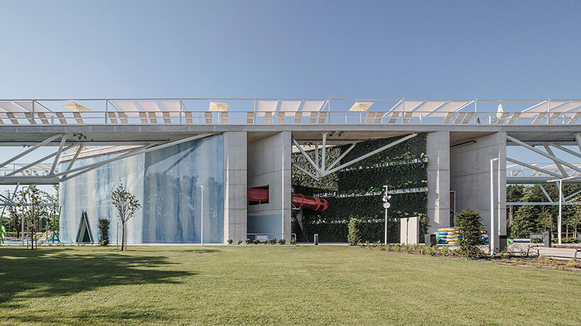 geometry, water and flora blend within BORD's aquaticum water park in debrecen, hungary