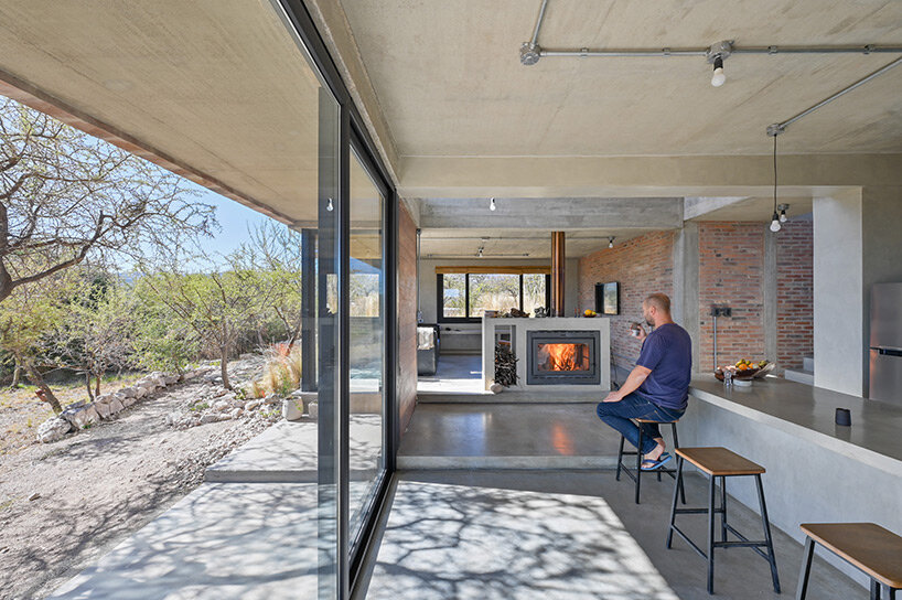 locally made bricks form energy efficient artist residence by loma arquitectos in argentina