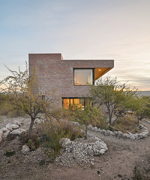 locally made bricks form energy efficient artist residence by loma arquitectos in argentina