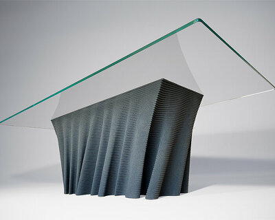 duffy london 3D prints free-flowing 'dune' table using black quartz sand