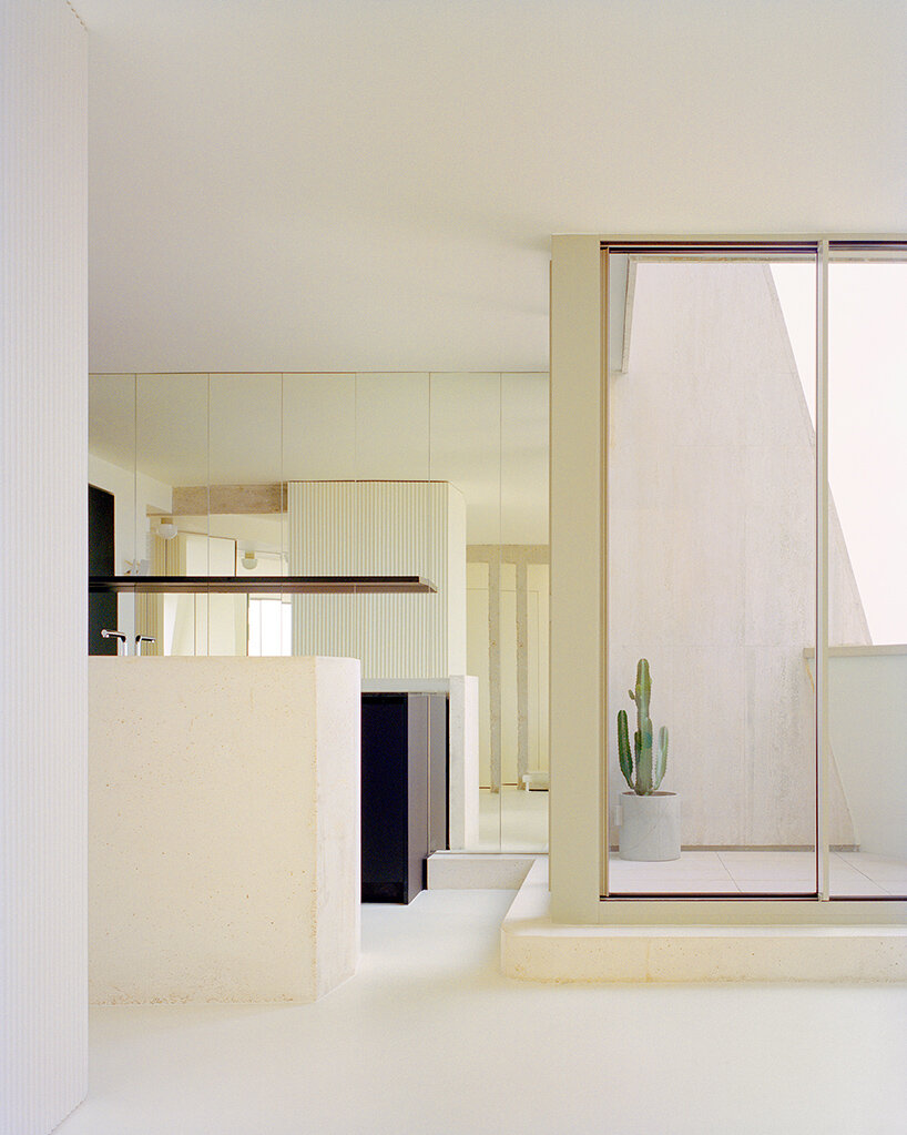 this apartment by clément lesnoff-rocard is suspended above the rooftops of paris