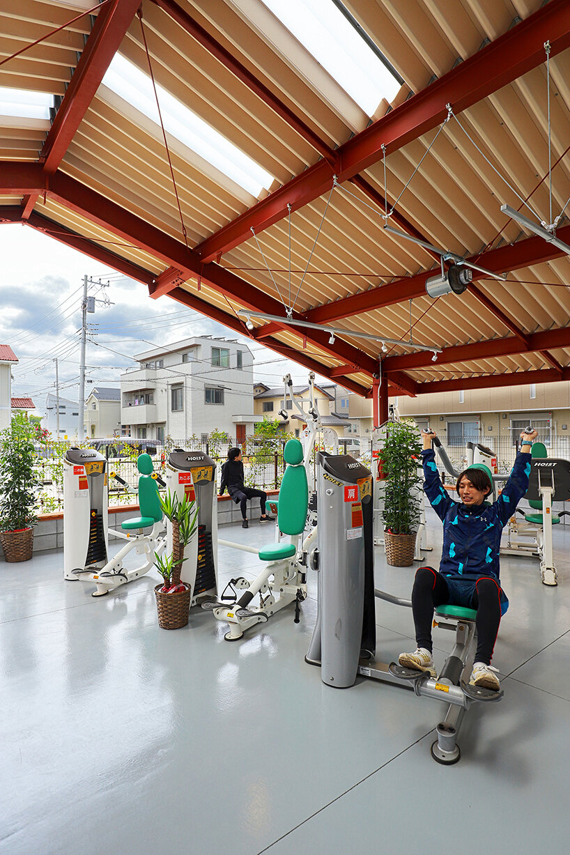 sugawaradaisuke enlivens japanese town with biophilic, semi-outdoor gym