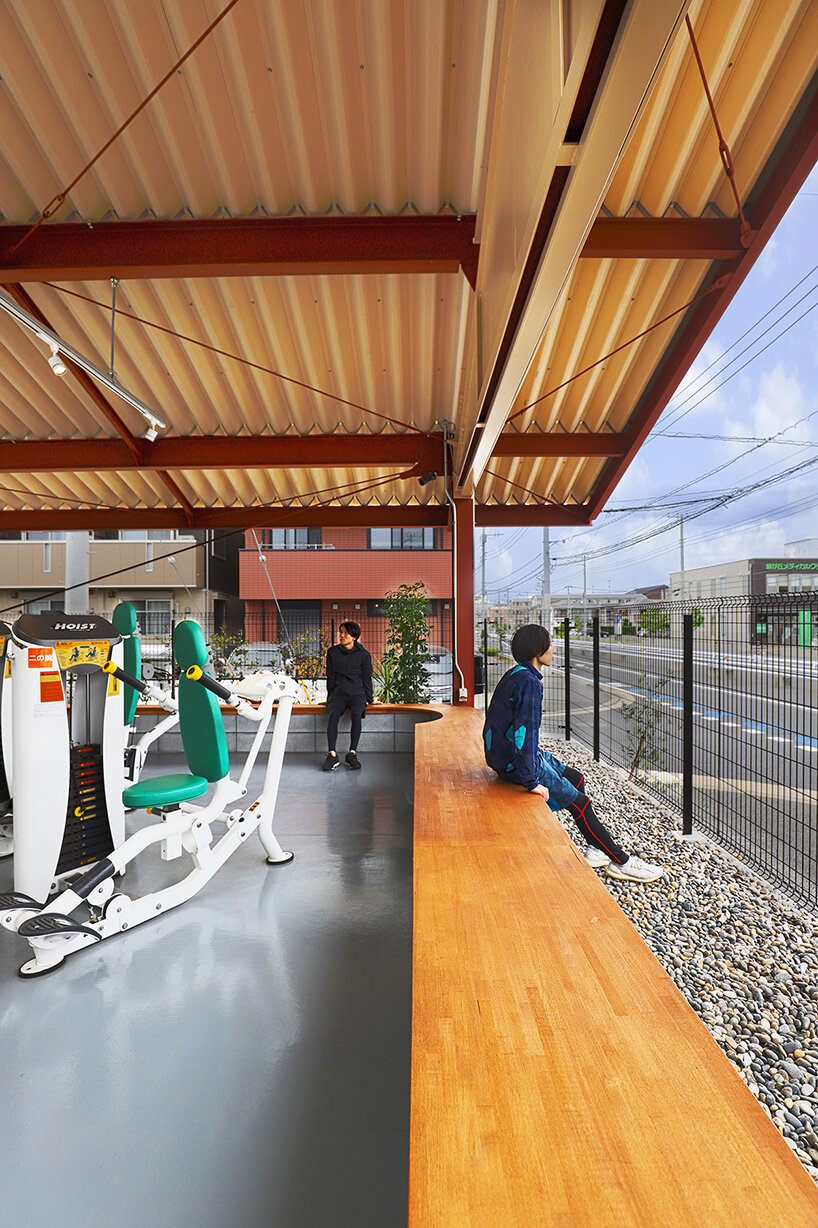 sugawaradaisuke enlivens japanese town with biophilic, semi-outdoor gym