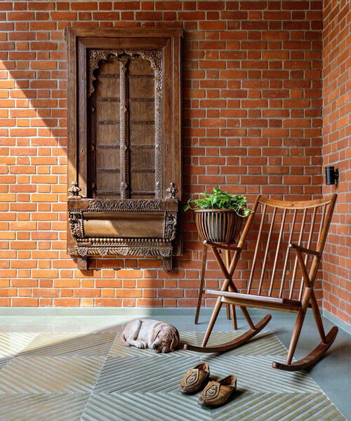 K.N. associates’ brick + RCC home infuses indian heritage with contemporary design