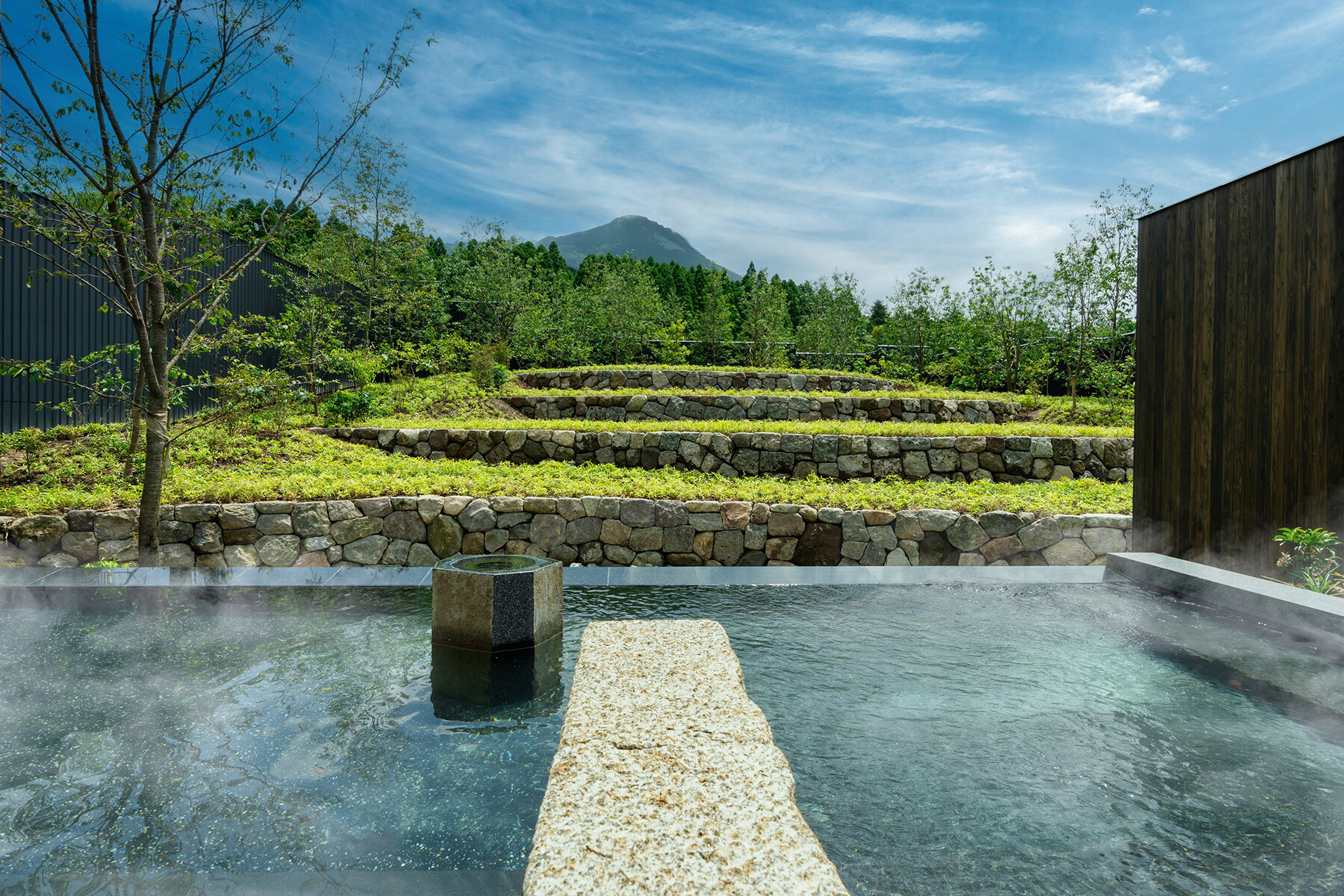 Kengo Kuma Scatters Hot Spring Hotel Across Sculpted Rice Terraces