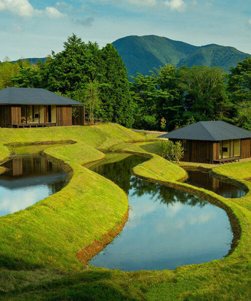 kengo kuma scatters hot spring hotel across sculpted rice terraces