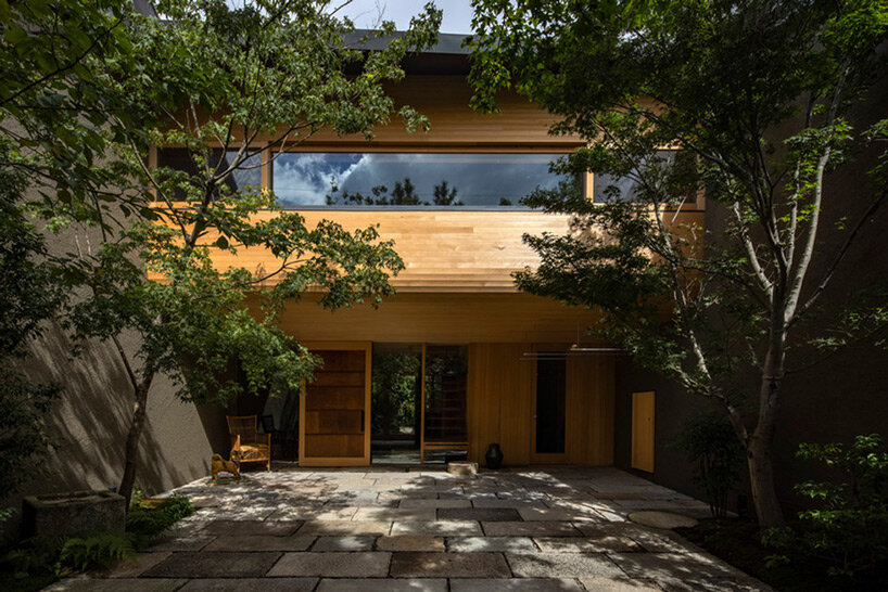 lush gardens and cave-like interiors characterize kyoto house by dai nagasaka/mega