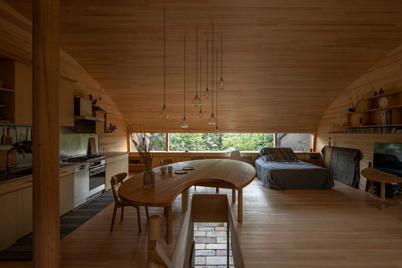 lush gardens and cave-like interiors characterize kyoto house by dai nagasaka/mega