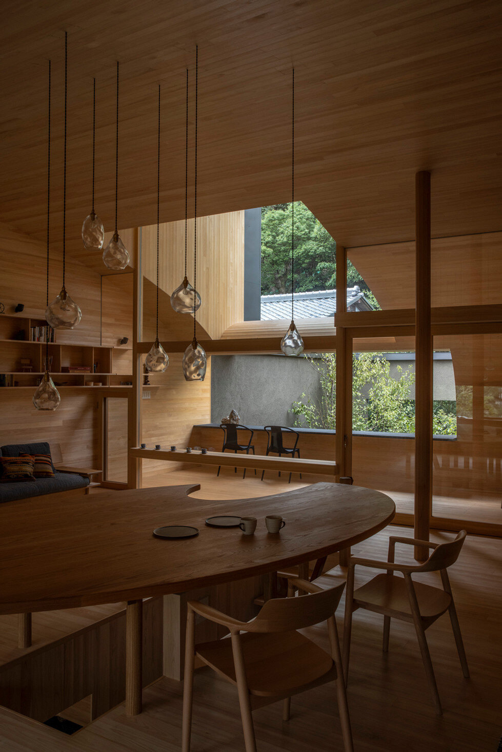 lush gardens and cave-like interiors characterize kyoto house by dai nagasaka/mega