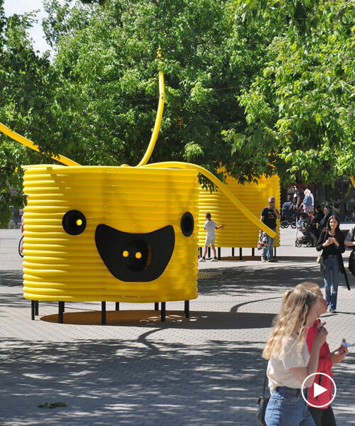 moradavaga’s giant yellow characters are acoustically interconnected in square in sweden