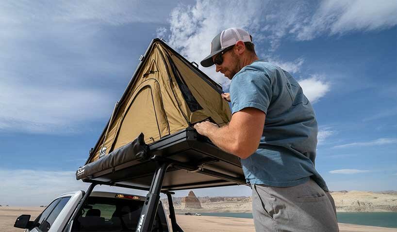 this lightweight pop-up tent creates a tiny sleek home on wheels