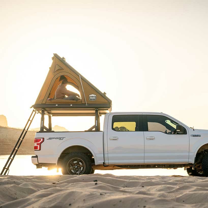 this lightweight pop-up tent creates a sleek tiny home on wheels