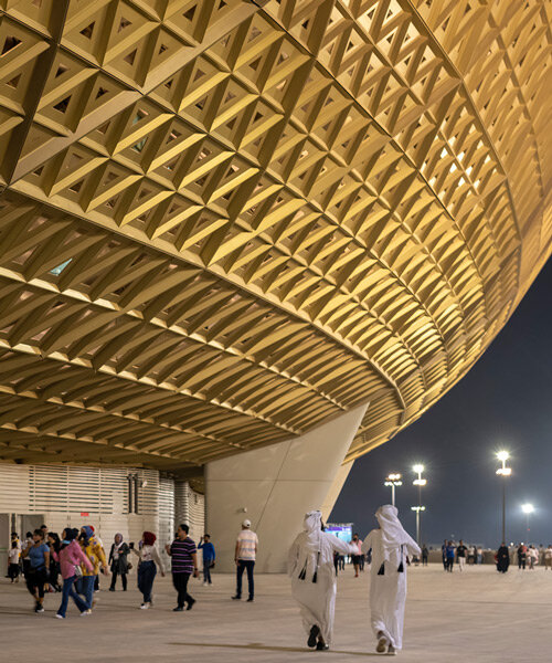 foster and partners' lusail stadium stands as a sparkling 'golden vessel' in qatar