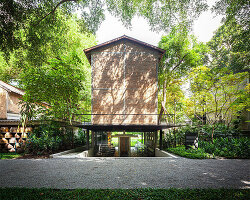 undulating bamboo canopy tops oval teahouse by pablo luna within lush  jungle in bali