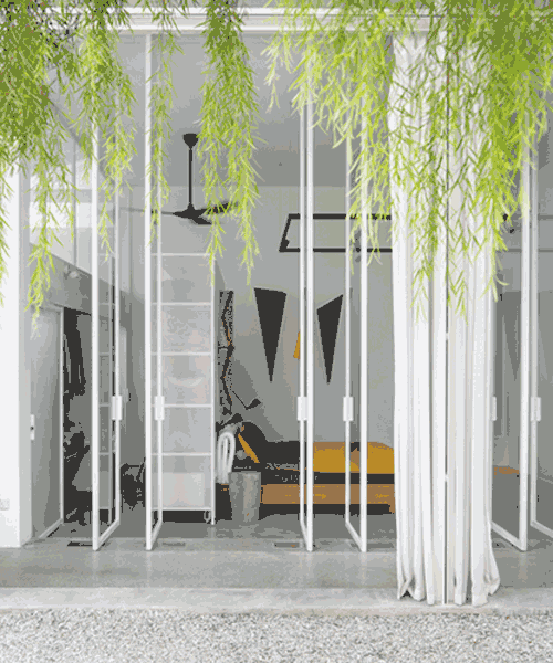 permeable spaces define 'introverse', a minimal home for an introverted architect in malaysia