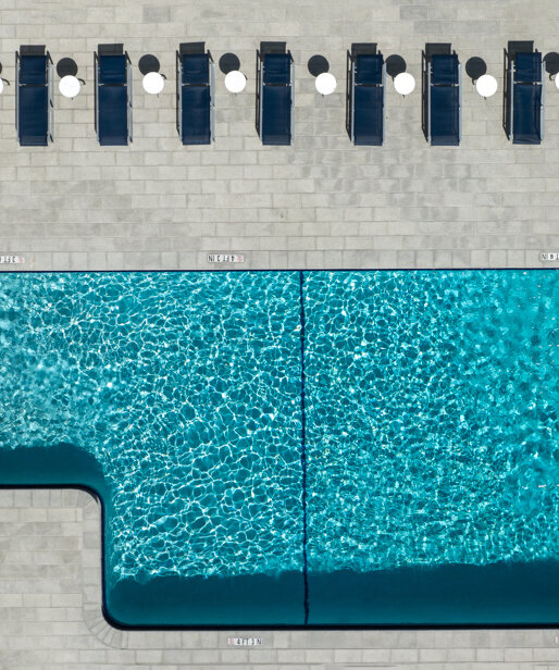 brad walls experiments with negative space & blue hues for 'pools from above' photo series