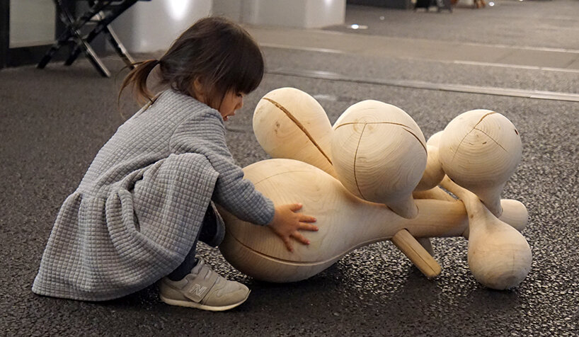 yuji tanabe architects' cloud-inspired wooden chair welcomes playful exploration