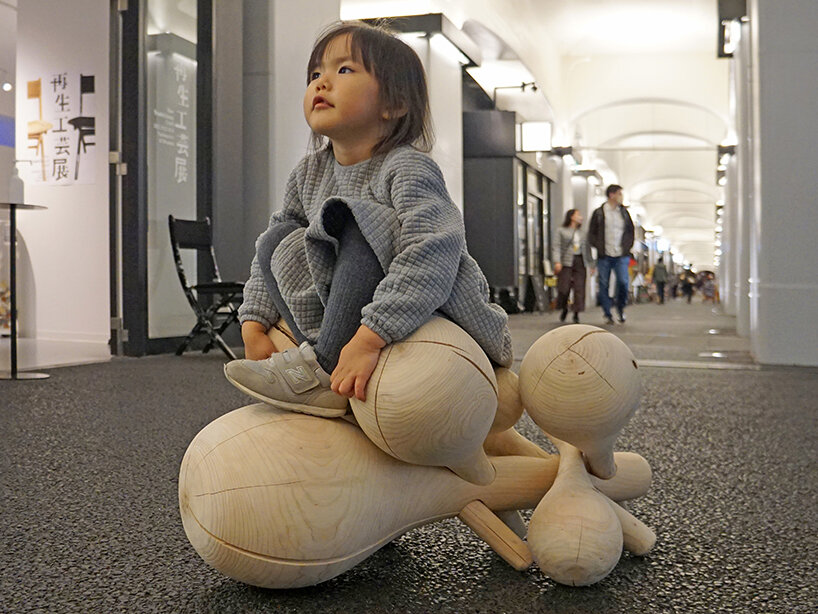 yuji tanabe architects' cloud-inspired wooden chair welcomes playful exploration