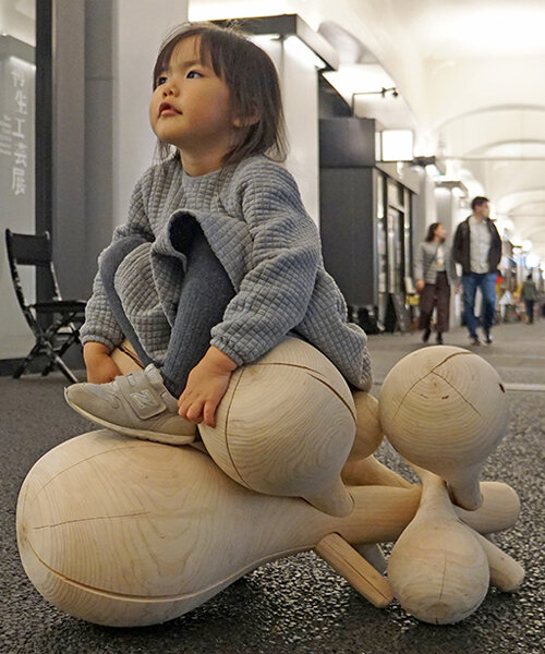 yuji tanabe architects' cloud-inspired wooden chair welcomes playful exploration