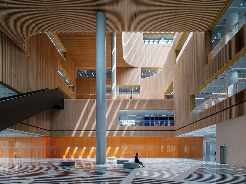 one of the world's largest libraries opens in shanghai, boasting sculptural forms