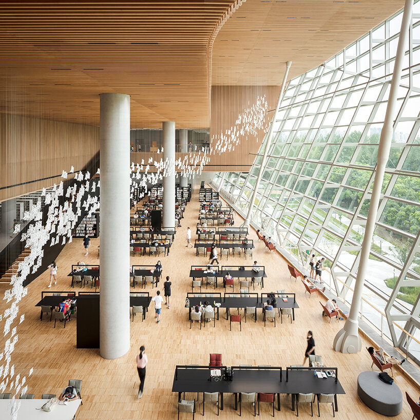 one of the largest libraries in the world opens in Shanghai, with sculptural forms