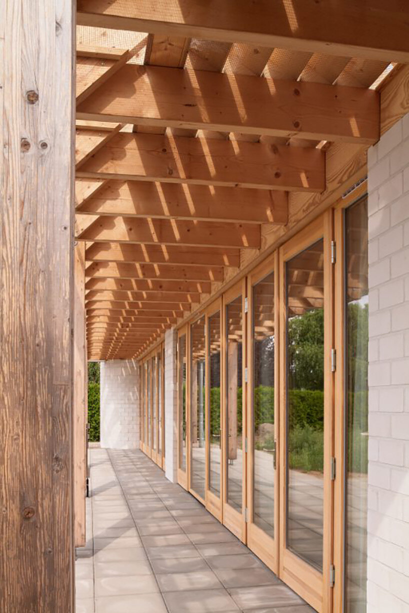 sigurd larsen tops weekend home in german countryside with clear glass gable roof