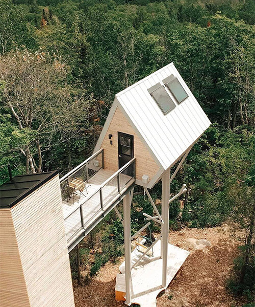 UHU micro-cabin on stilts rises from the ground to offer generous river views in canada