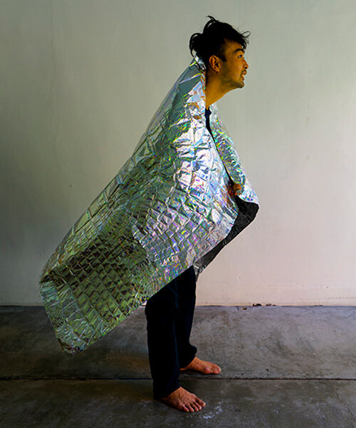 embossed aluminum sheets form reptilian silver cloak by kenta yoshizawa